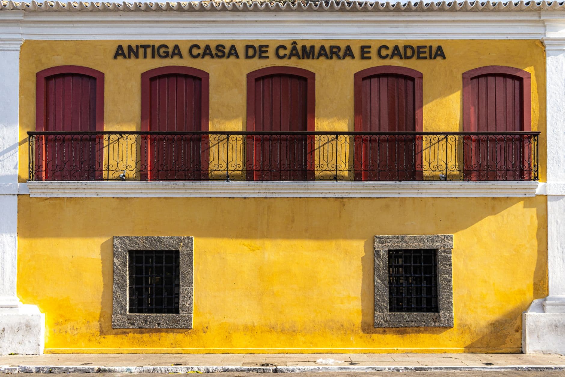 Historic yellow building facade in Brazil with cultural and architectural significance.