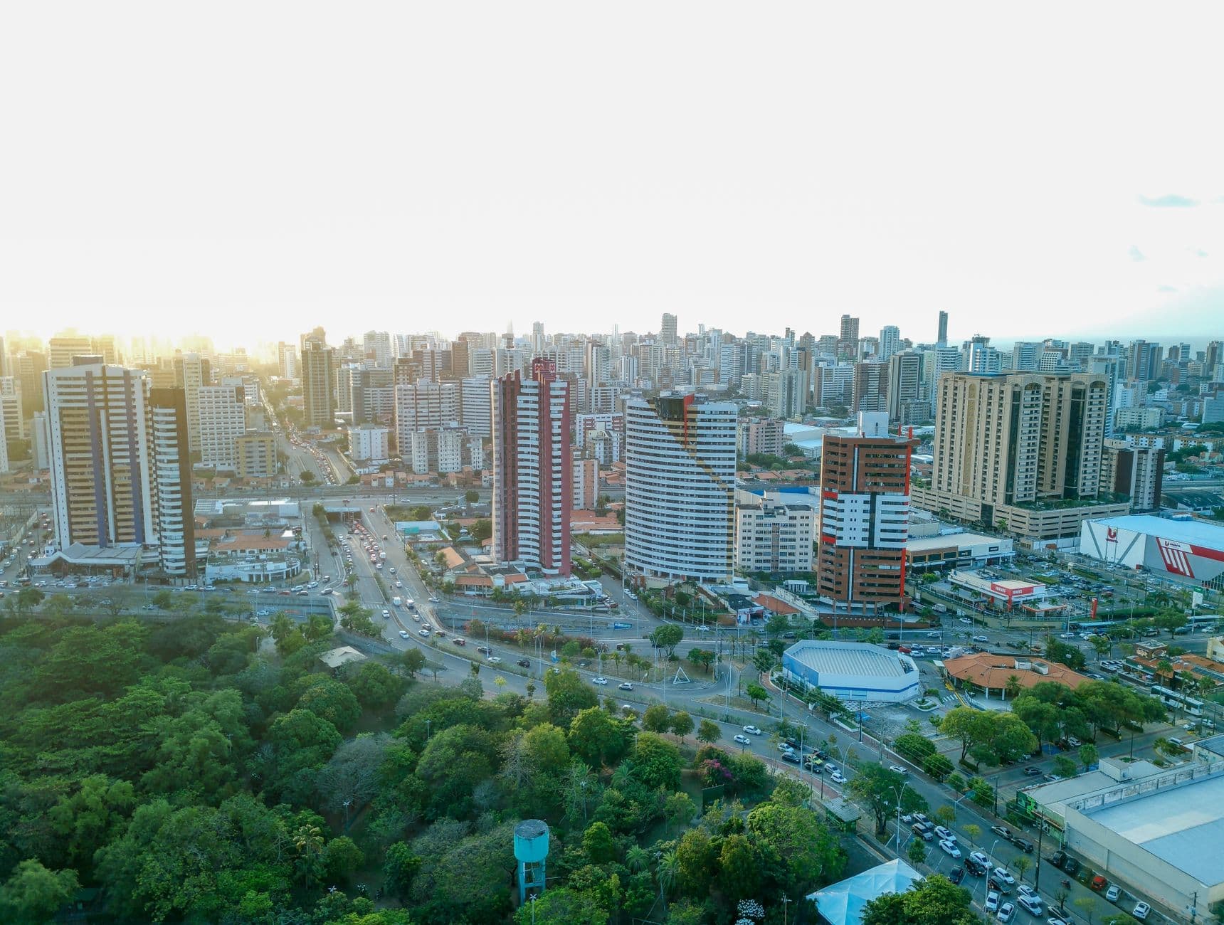A stunning aerial view of the modern skyline and lush greenery of Fortaleza, Brazil.