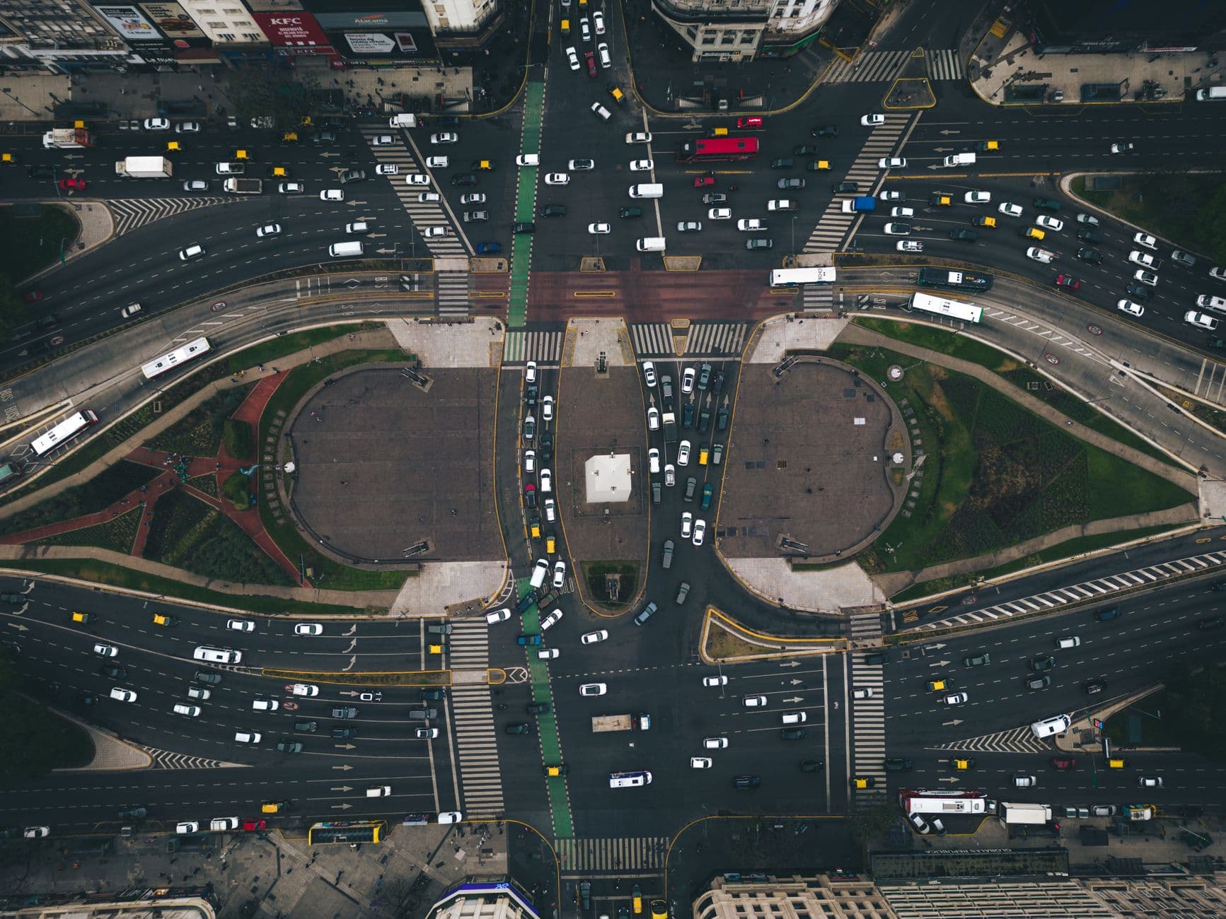 Aerial view of a busy intersection in Buenos Aires, depicting vibrant urban life.
