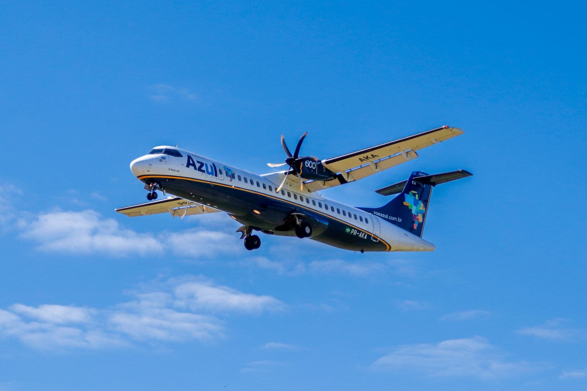 ATR 72-600 aircraft from Azul Airlines flying against a clear blue sky.