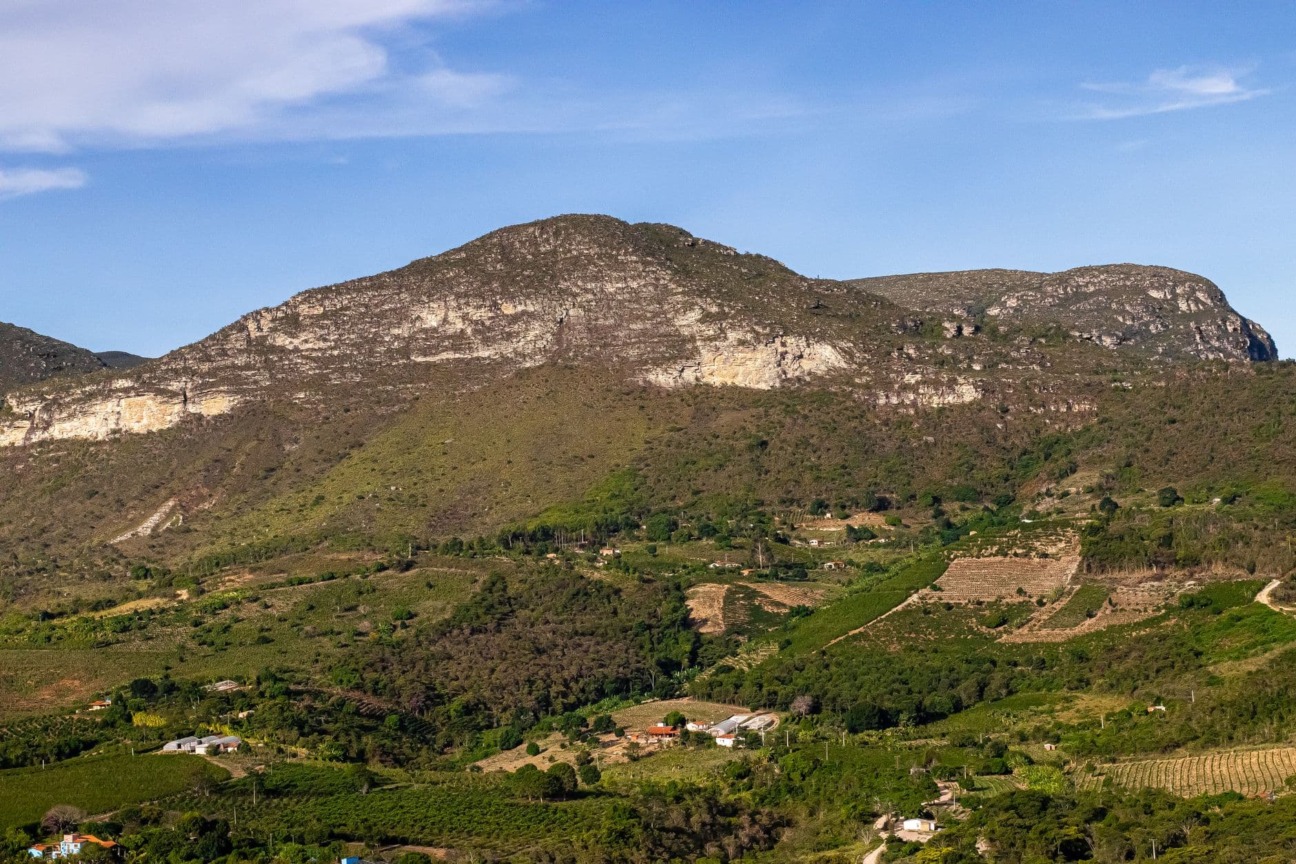 Breathtaking view of Chapada Diamantina's rugged landscape in Ibicoara, Brazil showcasing lush valleys and majestic mountains.