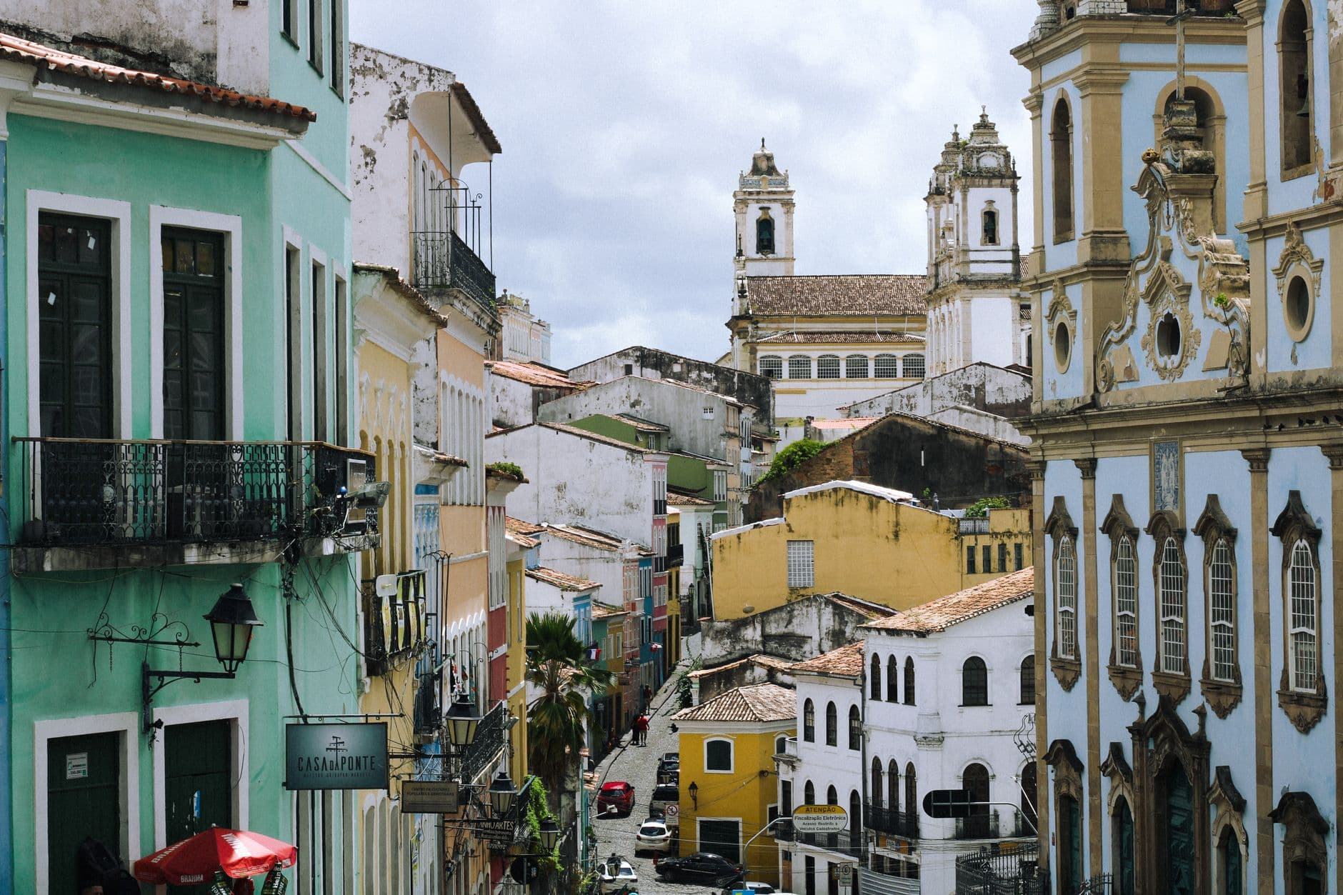 Street view of vibrant colonial buildings in Salvador's historic district, Brazil.