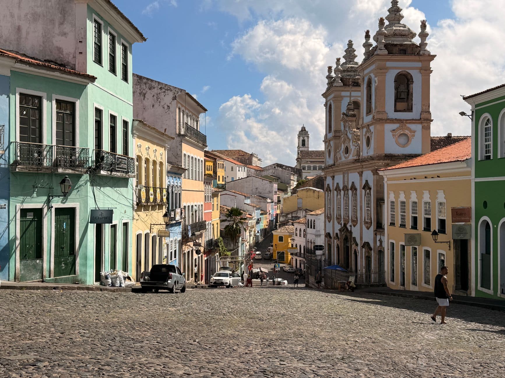 Charming view of Pelourinho's vibrant colonial architecture under a sunny sky in Salvador, Brazil.
